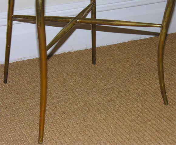 A Set of Four Brass Cafe Chairs. 1
