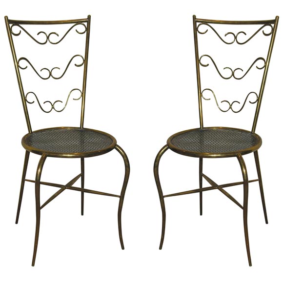 A Set of Four Brass Cafe Chairs.