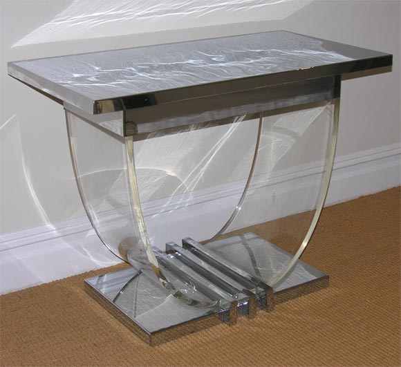 An Art Deco Style Chrome and Lucite Console Table.