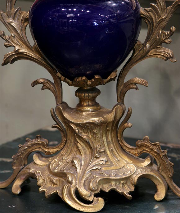 Pair of Porcelain Vases Mounted with Bronze Candelabra