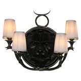 Four Light Iron and Bronze Wall Sconce with Lion's Head Decor