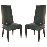 Set of 12 Dining Chairs by Jacques Adnet