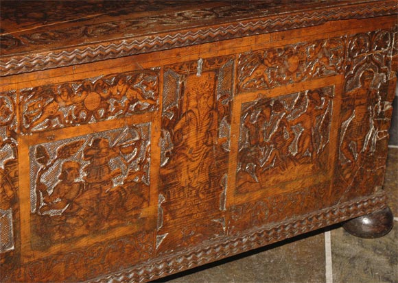 Walnut Italian baroque carved and ink-decorated cassone For Sale