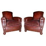 Antique Pair leather club chairs with velour seats