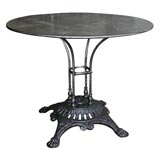 Polished steel bistro table w/ heavy cast iron base