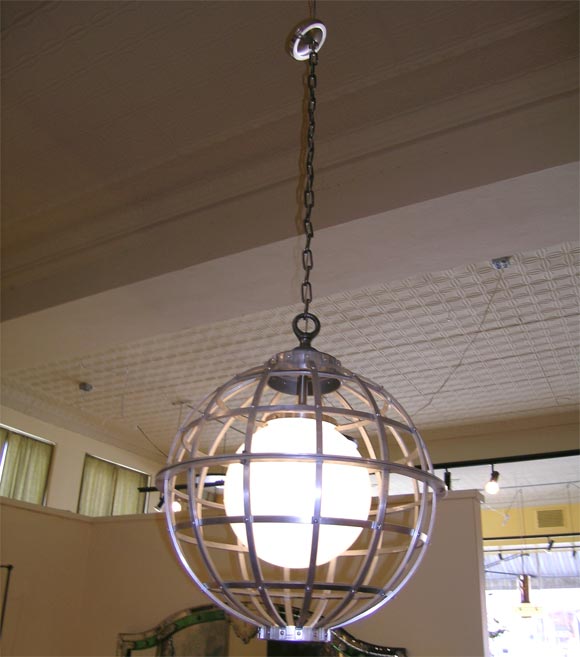 aluminum globe light fixture with white glass ball. Produced by us.