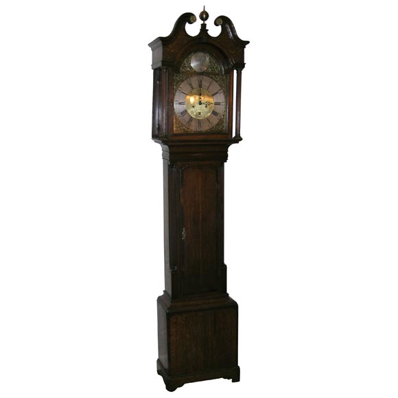 A Oak and Mahogany Tall Case Clock by Peter Evers