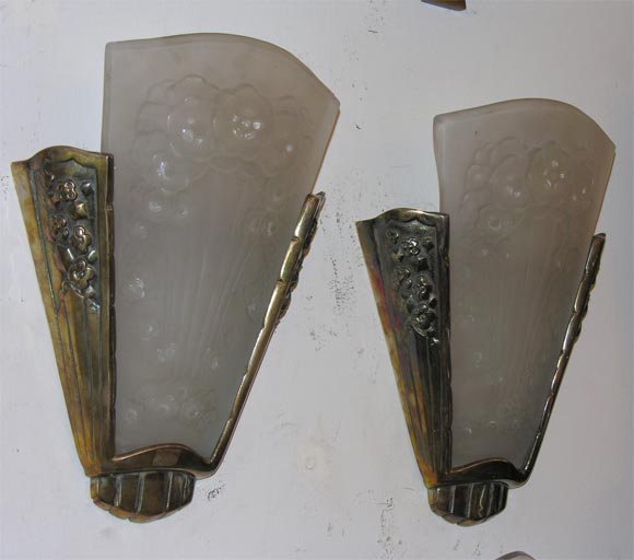 Frosted glass and silvered bronze wall sconces, glass signed "Muller Freres."