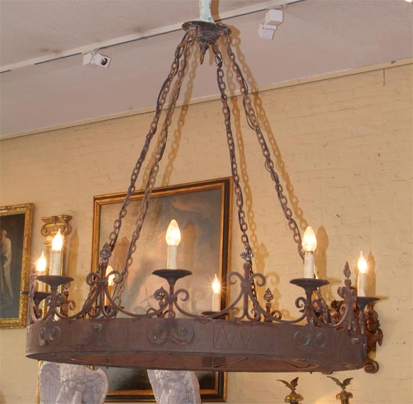 Spanish baroque wrought-iron eight-light chandelier, now electrified.