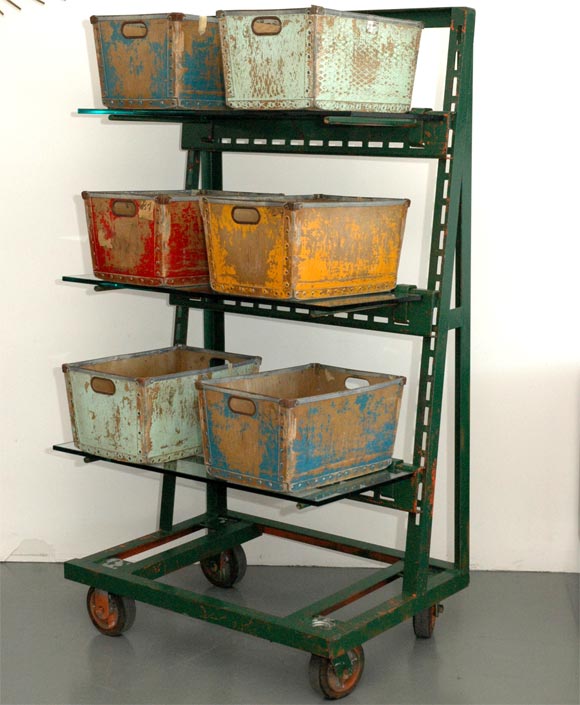 Green Industrial Rolling Cart with Glass Shelves.