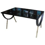 Glass topped coffee table in the manner of Adnet