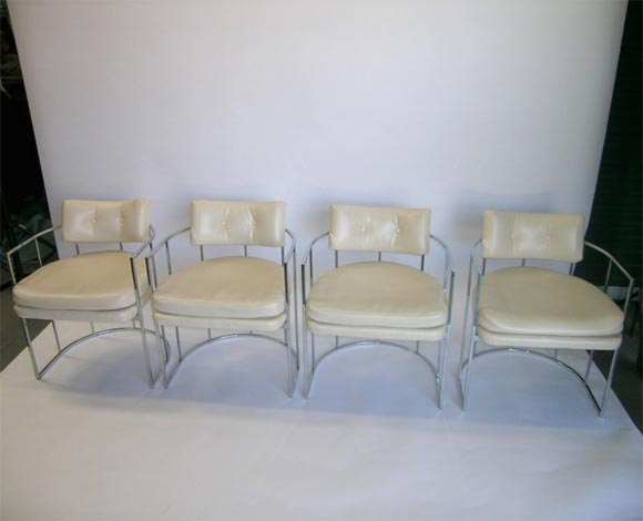 A Set of Four C Shaped Chrome Bridge Chairs