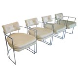 A Set of Four C Shaped Chrome Bridge Chairs