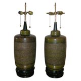 STUNNING PAIR OF LARGE TEXTURED CERAMIC LAMPS ON ORIENTAL BASES.