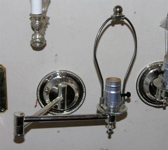 silverplated swing arm sconces