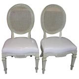 Exagerated Louis-style side chairs