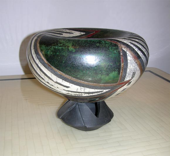 One signed earth based abstract oval bowl