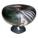 One signed earth based abstract oval bowl