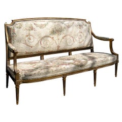 Gilted carved wood and tapestry settee
