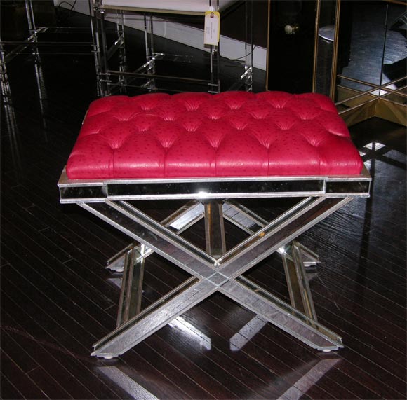 Pair of custom silver trim mirrored X-band benches, with red tufted embossed ostrich leather top. Customization is available in different sizes, finishes and leather/fabrics.