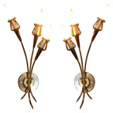 pair of brass three light sconces with tulip form