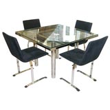 Table and chairs by Tobia Scarpa for Saporiti Italia