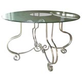 A Gilded Wrought Iron and Glass Entry Table