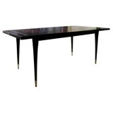 Tommy Parzinger dining table for Charak Modern