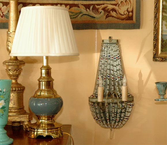 Pair of tole mirrored sconces