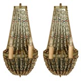 Pair of tole mirrored sconces