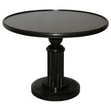An Art Deco Round pedestal Base Walnut Table.