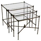 A Set of Patinated Brass and Glass "Bamboo" Nesting Tables