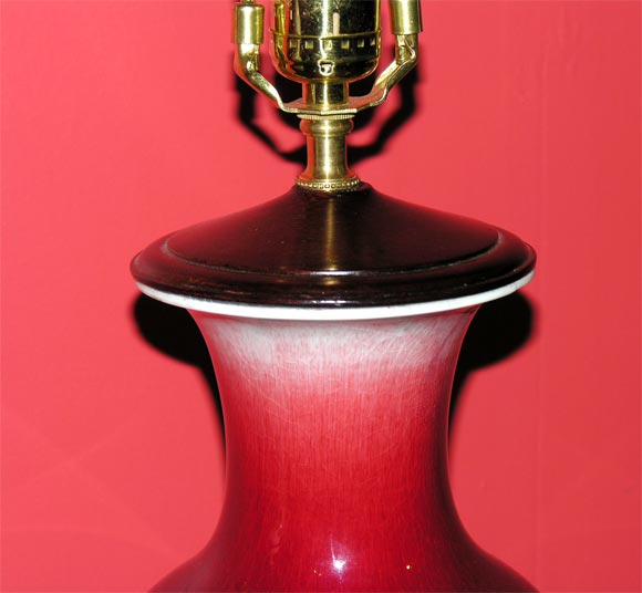 Pair of ox-blood fish-tail vase lamps. In Excellent Condition In New York, NY