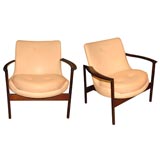 pair of elizabeth armchairs by Ib Kofod Larsen in cream leather