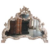 Rococo silver-gilt over-mantle mirror