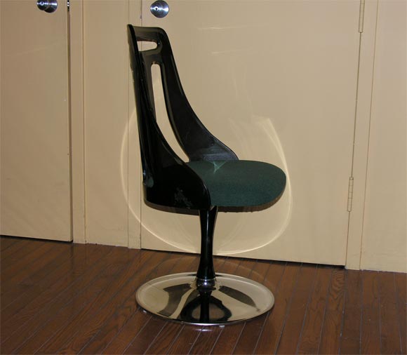 Modern-style swivel chairs in smoked plexi-glass with upholstered seat, black enameled pedestal leg and chromed metal base; priced as pair, available individually
