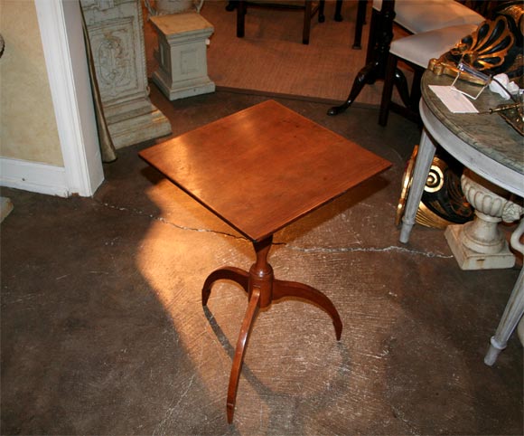 Very interesting American cherry candle stand with exaggerated spider arched legs giving it a contemporary feel.