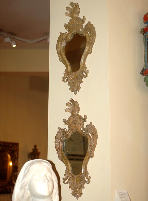 Pair of Italian walnut mirrors