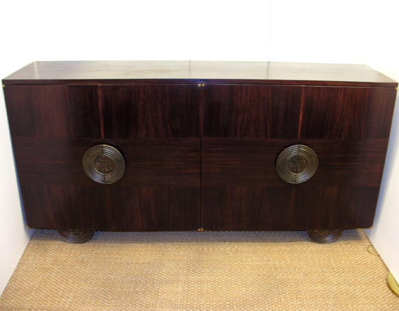 A rosewood sideboard in the manner of Gaetano Borsani