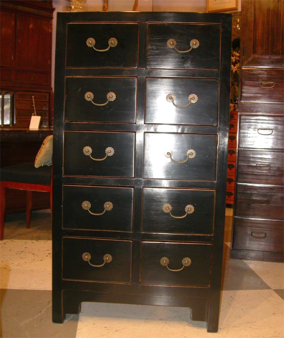 Shanxi Provence Chest of Drawers.  Black Laquer over Elmwood.  Original Brass hardware.  Ten Drawers.  All of the interior drawers have been restored.  The sister chest is on this website.  They look incredible together.