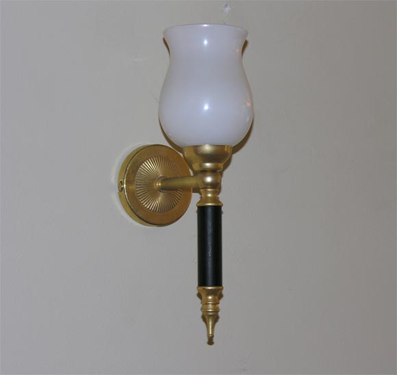 A pair of brass and opaline glass  French sconces.