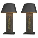Elegant pair of iron cast lamps