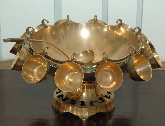 Brass Serving set.  Punch Bowl with 12 cups and spoon. Cut out and etched Details.
