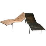 Vintage pair of woven iron loungers