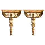 Antique Pair of Italian gilt and polychrome consoles.