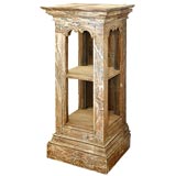 Faux marble etagere with  molded cornice and base.