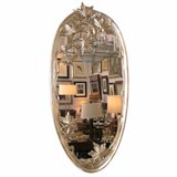 A Carved Wood and Gessoed 22K White Gold Mirror