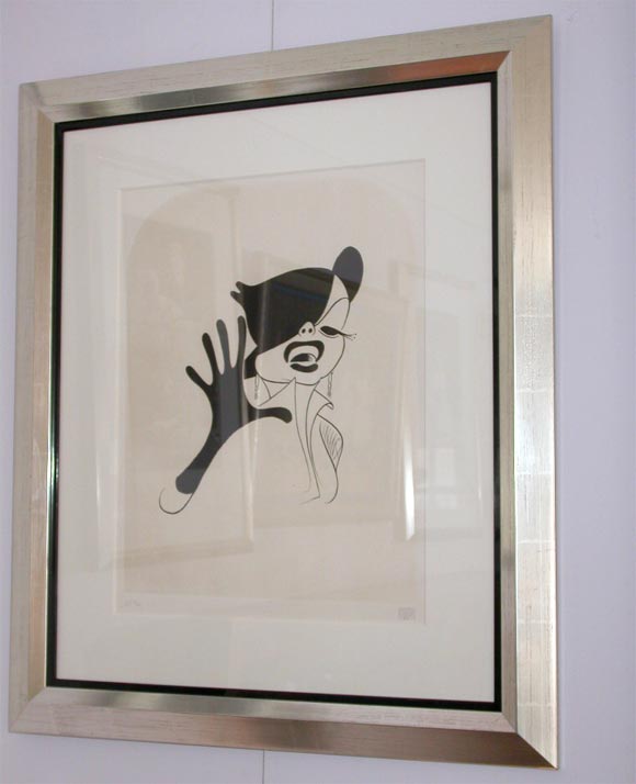 A custom framed lithograph of legendary actress Judy Garland created by Al Hirschfeld signed and numbered: Hirschfeld AP3/40.