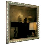 BEAUTIFUL JAMES MONT MIRROR WITH AN ELABORATE CARVED FRAME.