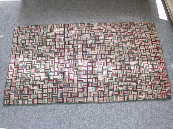 1930S HAND HOOKED MINI-LOG CABIN RUG